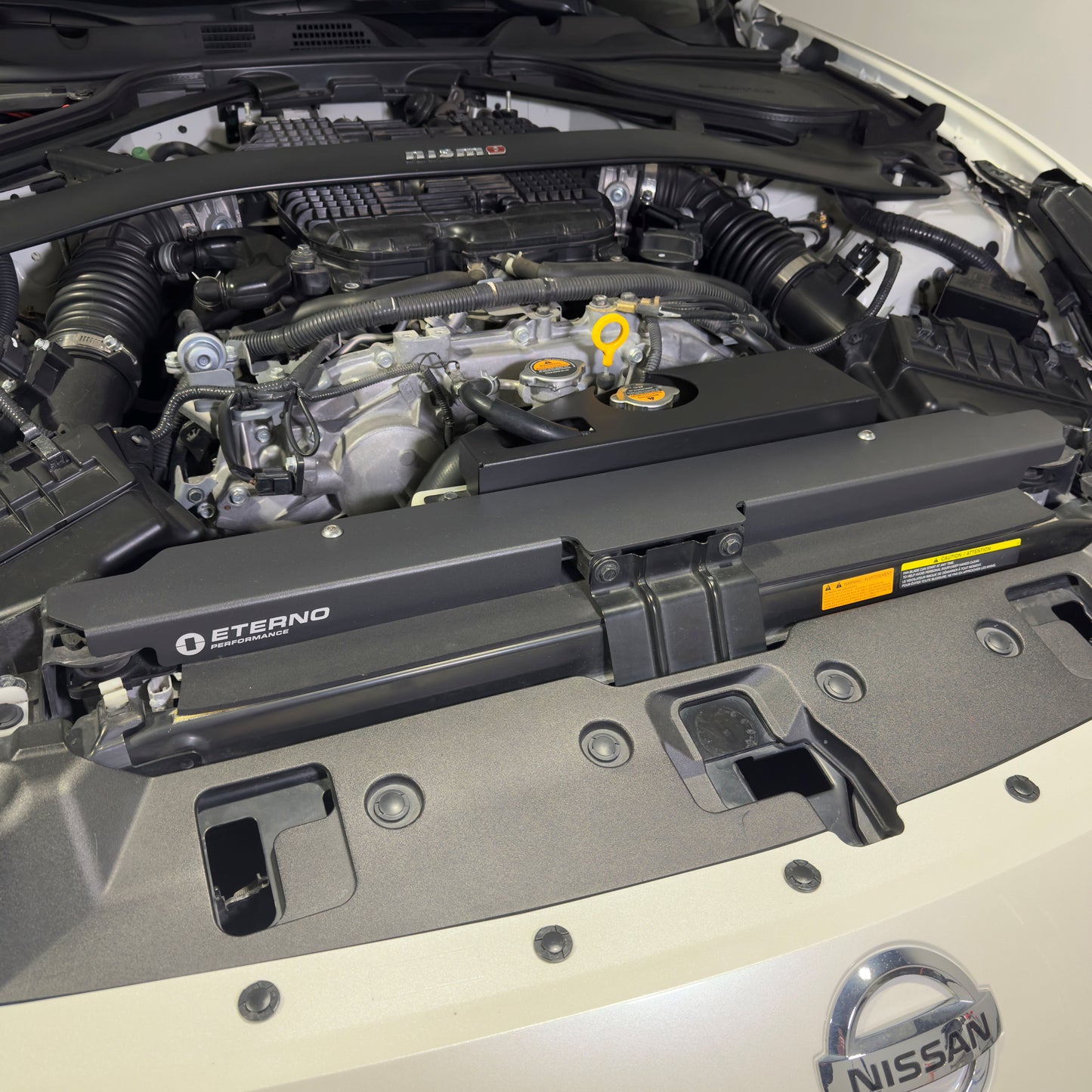 Nissan 370Z engine bay with Eterno Performance radiator core support plate